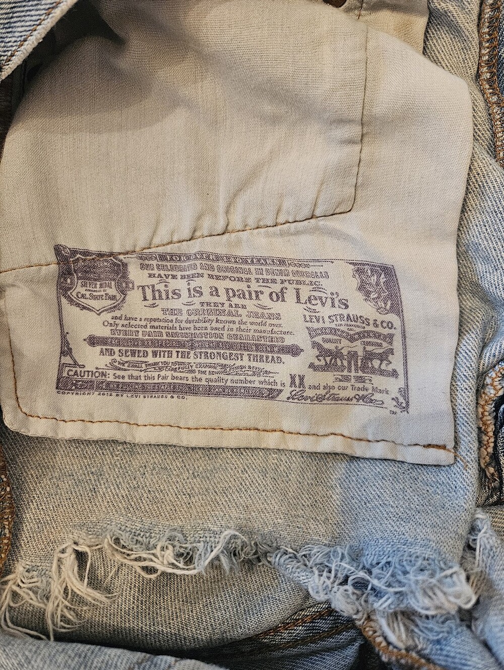 Distressed Levi's Cutoffs - Picture 8 of 8